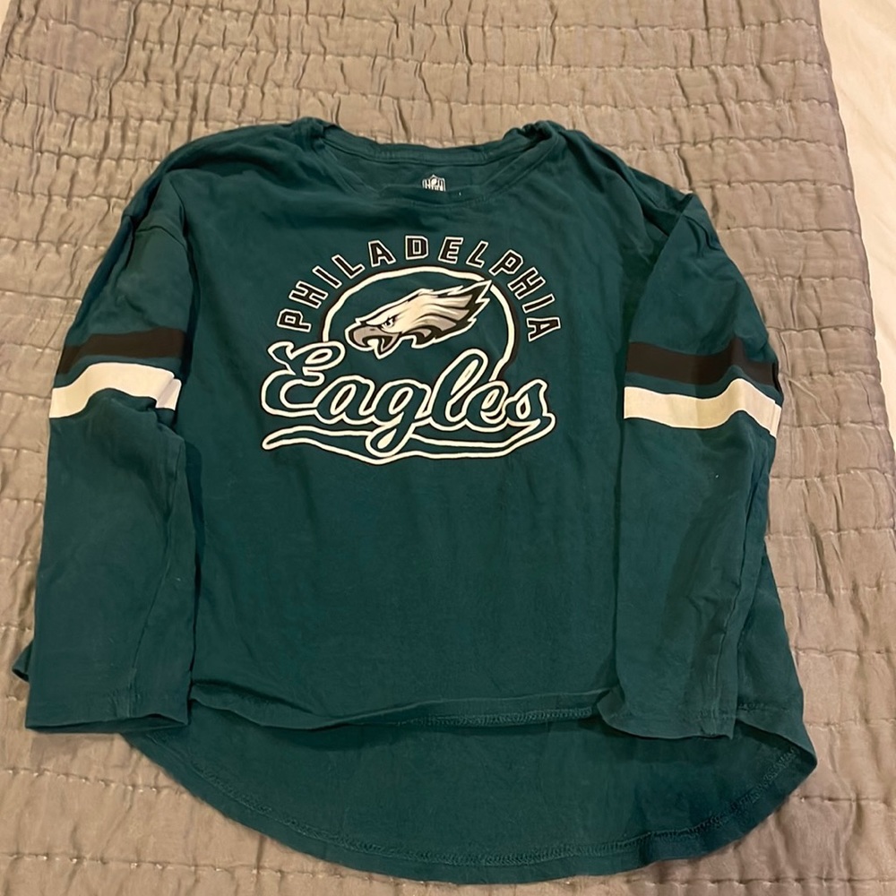 Girls Philadelphia eagles t shirt size medium. Fairly good condition.
